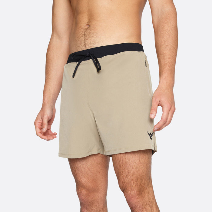 Flow Men's Lined Hot Yoga Shorts 5 Inch in khaki with pockets for convenient storage.