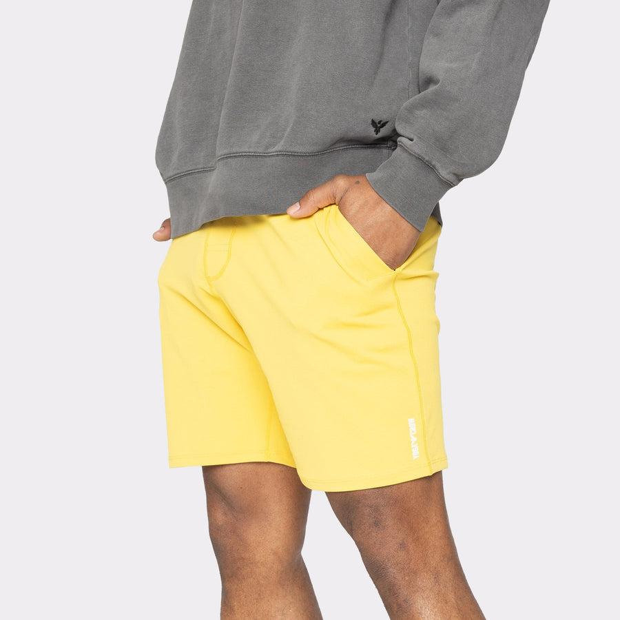 Swerve Men's Lined Yoga Shorts 7 Inch in Sulfur Yellow, designed for performance and comfort during workouts.