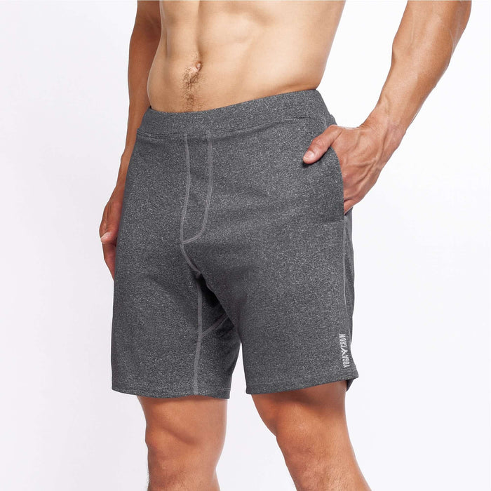 4-way stretch Swerve Shorts in Heather Grey worn by a man, showcasing comfort and flexibility for cross training.