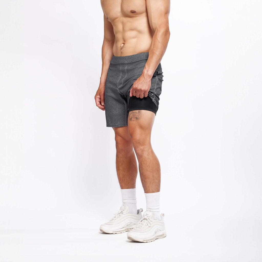 4-way stretch swerve shorts in heather grey, designed for men's movement practices and enhanced flexibility.